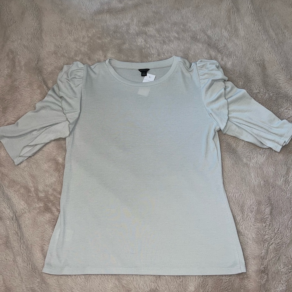 Ann Taylor 3/4 sleeve tan shirt. Has some ruffles on it as well. Size M